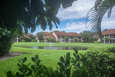 End unit villa in Boca Pointe's La Mirada with soaring ceilings on Boca Pointe Country Club in Florida - for sale on GolfHomes.com, golf home, golf lot