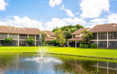 End unit villa in Boca Pointe's La Mirada with soaring ceilings on Boca Pointe Country Club in Florida - for sale on GolfHomes.com, golf home, golf lot