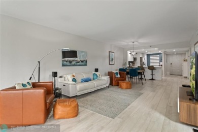 Beautifully renovated, spacious residence with large, screened on Palm-Aire Country Club and Resort - Palms in Florida - for sale on GolfHomes.com, golf home, golf lot
