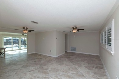 ATTENTION BOATERS!!! Here is a rare completely renovated on Gulf Harbors Golf Course in Florida - for sale on GolfHomes.com, golf home, golf lot