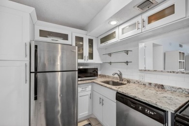A bright and spacious 2-bedroom, 2-bathroom condo located in the on Palm-Aire Country Club and Resort - Palms in Florida - for sale on GolfHomes.com, golf home, golf lot