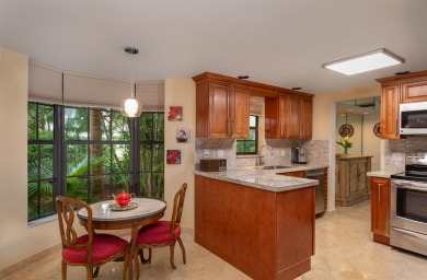 End unit villa in Boca Pointe's La Mirada with soaring ceilings on Boca Pointe Country Club in Florida - for sale on GolfHomes.com, golf home, golf lot