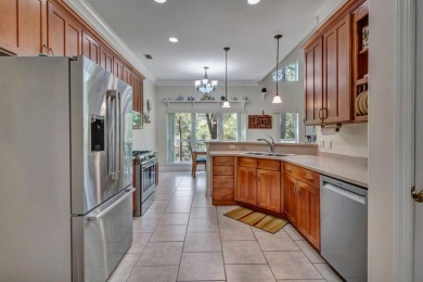 Beautifully updated 5BR 2.5BA lakefront home on over half and on Rocky Bayou Country Club in Florida - for sale on GolfHomes.com, golf home, golf lot