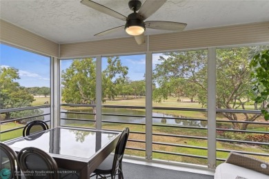Beautifully renovated, spacious residence with large, screened on Palm-Aire Country Club and Resort - Palms in Florida - for sale on GolfHomes.com, golf home, golf lot