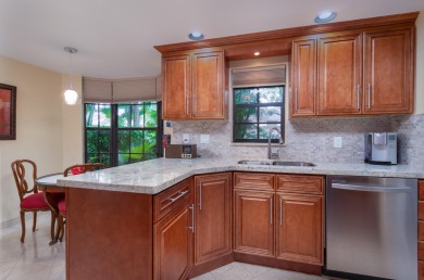 End unit villa in Boca Pointe's La Mirada with soaring ceilings on Boca Pointe Country Club in Florida - for sale on GolfHomes.com, golf home, golf lot