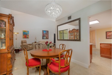 End unit villa in Boca Pointe's La Mirada with soaring ceilings on Boca Pointe Country Club in Florida - for sale on GolfHomes.com, golf home, golf lot