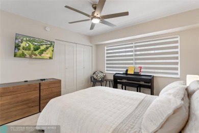 Beautifully renovated, spacious residence with large, screened on Palm-Aire Country Club and Resort - Palms in Florida - for sale on GolfHomes.com, golf home, golf lot