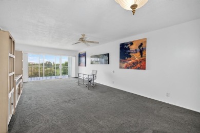 A bright and spacious 2-bedroom, 2-bathroom condo located in the on Palm-Aire Country Club and Resort - Palms in Florida - for sale on GolfHomes.com, golf home, golf lot