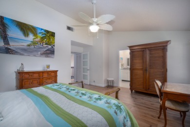 End unit villa in Boca Pointe's La Mirada with soaring ceilings on Boca Pointe Country Club in Florida - for sale on GolfHomes.com, golf home, golf lot