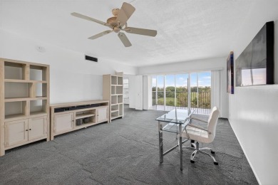 A bright and spacious 2-bedroom, 2-bathroom condo located in the on Palm-Aire Country Club and Resort - Palms in Florida - for sale on GolfHomes.com, golf home, golf lot