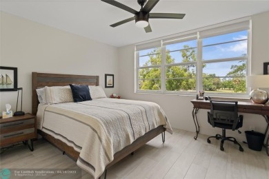 Beautifully renovated, spacious residence with large, screened on Palm-Aire Country Club and Resort - Palms in Florida - for sale on GolfHomes.com, golf home, golf lot