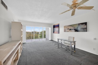 A bright and spacious 2-bedroom, 2-bathroom condo located in the on Palm-Aire Country Club and Resort - Palms in Florida - for sale on GolfHomes.com, golf home, golf lot