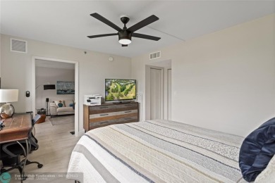 Beautifully renovated, spacious residence with large, screened on Palm-Aire Country Club and Resort - Palms in Florida - for sale on GolfHomes.com, golf home, golf lot