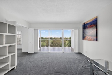 A bright and spacious 2-bedroom, 2-bathroom condo located in the on Palm-Aire Country Club and Resort - Palms in Florida - for sale on GolfHomes.com, golf home, golf lot