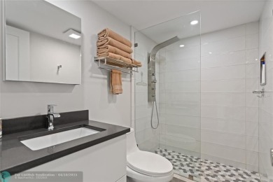 Beautifully renovated, spacious residence with large, screened on Palm-Aire Country Club and Resort - Palms in Florida - for sale on GolfHomes.com, golf home, golf lot