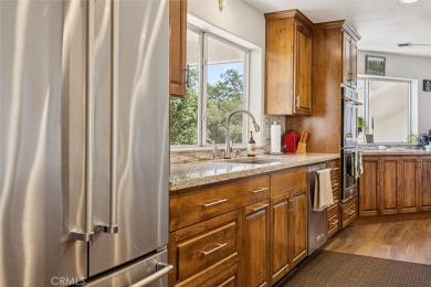 With panoramic views and timeless upgrades, 9230 Las Lomas on Chalk Mountain Golf Course in California - for sale on GolfHomes.com, golf home, golf lot