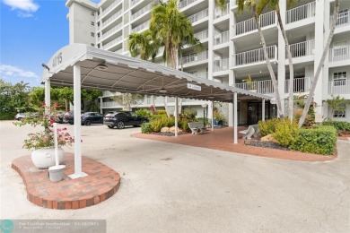 Beautifully renovated, spacious residence with large, screened on Palm-Aire Country Club and Resort - Palms in Florida - for sale on GolfHomes.com, golf home, golf lot