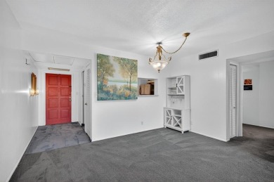 A bright and spacious 2-bedroom, 2-bathroom condo located in the on Palm-Aire Country Club and Resort - Palms in Florida - for sale on GolfHomes.com, golf home, golf lot