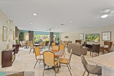 Beautifully renovated, spacious residence with large, screened on Palm-Aire Country Club and Resort - Palms in Florida - for sale on GolfHomes.com, golf home, golf lot