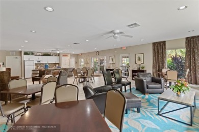 Beautifully renovated, spacious residence with large, screened on Palm-Aire Country Club and Resort - Palms in Florida - for sale on GolfHomes.com, golf home, golf lot
