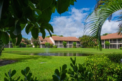 End unit villa in Boca Pointe's La Mirada with soaring ceilings on Boca Pointe Country Club in Florida - for sale on GolfHomes.com, golf home, golf lot