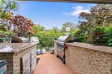 Beautifully renovated, spacious residence with large, screened on Palm-Aire Country Club and Resort - Palms in Florida - for sale on GolfHomes.com, golf home, golf lot