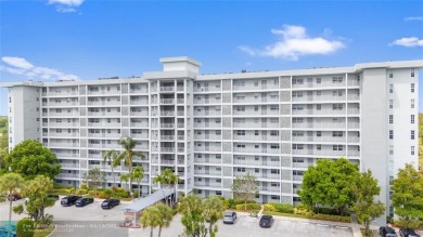 Beautifully renovated, spacious residence with large, screened on Palm-Aire Country Club and Resort - Palms in Florida - for sale on GolfHomes.com, golf home, golf lot