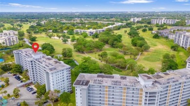 Beautifully renovated, spacious residence with large, screened on Palm-Aire Country Club and Resort - Palms in Florida - for sale on GolfHomes.com, golf home, golf lot