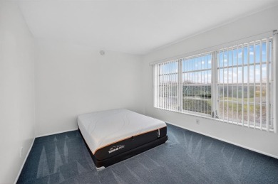 A bright and spacious 2-bedroom, 2-bathroom condo located in the on Palm-Aire Country Club and Resort - Palms in Florida - for sale on GolfHomes.com, golf home, golf lot