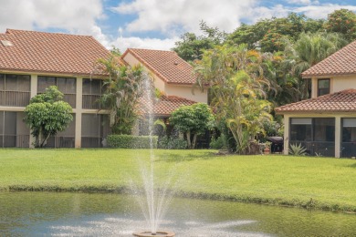 End unit villa in Boca Pointe's La Mirada with soaring ceilings on Boca Pointe Country Club in Florida - for sale on GolfHomes.com, golf home, golf lot