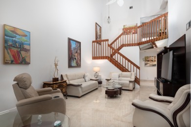 End unit villa in Boca Pointe's La Mirada with soaring ceilings on Boca Pointe Country Club in Florida - for sale on GolfHomes.com, golf home, golf lot