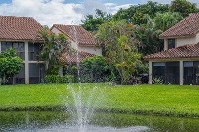 End unit villa in Boca Pointe's La Mirada with soaring ceilings on Boca Pointe Country Club in Florida - for sale on GolfHomes.com, golf home, golf lot