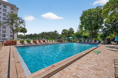A bright and spacious 2-bedroom, 2-bathroom condo located in the on Palm-Aire Country Club and Resort - Palms in Florida - for sale on GolfHomes.com, golf home, golf lot