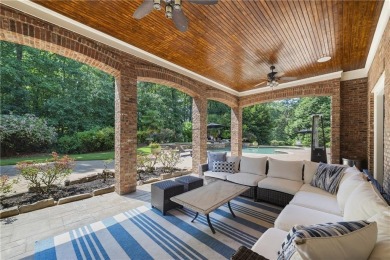 Set inside Milton's guard gated The Manor Golf & Country Club on Manor Golf and Country Club in Georgia - for sale on GolfHomes.com, golf home, golf lot