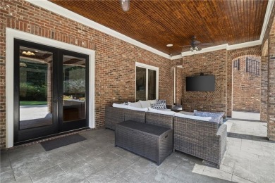 Set inside Milton's guard gated The Manor Golf & Country Club on Manor Golf and Country Club in Georgia - for sale on GolfHomes.com, golf home, golf lot