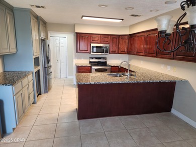 This spacious home is located on the golf course in the Panama on Panama Country Club in Florida - for sale on GolfHomes.com, golf home, golf lot