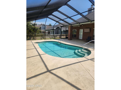 This spacious home is located on the golf course in the Panama on Panama Country Club in Florida - for sale on GolfHomes.com, golf home, golf lot