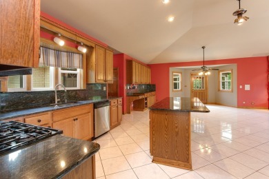 Opportunity knocks ~ this huge open layout brick ranch with a on St. Andrews Golf and Country Club in Illinois - for sale on GolfHomes.com, golf home, golf lot