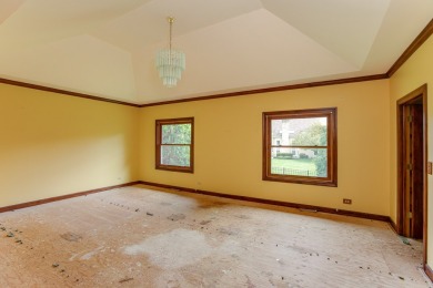 Opportunity knocks ~ this huge open layout brick ranch with a on St. Andrews Golf and Country Club in Illinois - for sale on GolfHomes.com, golf home, golf lot