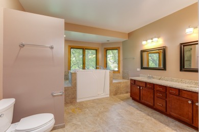 Opportunity knocks ~ this huge open layout brick ranch with a on St. Andrews Golf and Country Club in Illinois - for sale on GolfHomes.com, golf home, golf lot