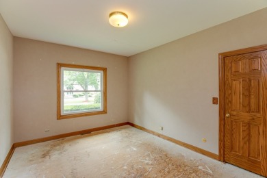 Opportunity knocks ~ this huge open layout brick ranch with a on St. Andrews Golf and Country Club in Illinois - for sale on GolfHomes.com, golf home, golf lot