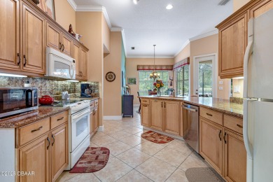 Coventry Model with a 2024 ROOF, resurfaced POOL in 2023 & NEWER on Plantation Bay Golf and Country Club in Florida - for sale on GolfHomes.com, golf home, golf lot