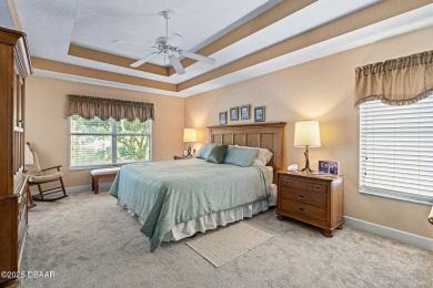 Coventry Model with a 2024 ROOF, resurfaced POOL in 2023 & NEWER on Plantation Bay Golf and Country Club in Florida - for sale on GolfHomes.com, golf home, golf lot
