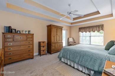 Coventry Model with a 2024 ROOF, resurfaced POOL in 2023 & NEWER on Plantation Bay Golf and Country Club in Florida - for sale on GolfHomes.com, golf home, golf lot