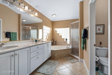 Coventry Model with a 2024 ROOF, resurfaced POOL in 2023 & NEWER on Plantation Bay Golf and Country Club in Florida - for sale on GolfHomes.com, golf home, golf lot
