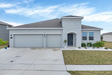Newly constructed in 2022, this home offers a stylish and on Royal St. Cloud Golf Links in Florida - for sale on GolfHomes.com, golf home, golf lot