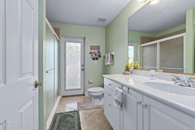 Coventry Model with a 2024 ROOF, resurfaced POOL in 2023 & NEWER on Plantation Bay Golf and Country Club in Florida - for sale on GolfHomes.com, golf home, golf lot