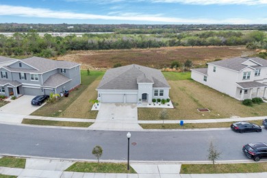 Newly constructed in 2022, this home offers a stylish and on Royal St. Cloud Golf Links in Florida - for sale on GolfHomes.com, golf home, golf lot