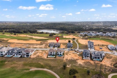 This stunning home is nestled within the prestigious gated golf on Bella Collina Golf Club in Florida - for sale on GolfHomes.com, golf home, golf lot