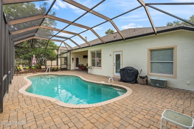 Coventry Model with a 2024 ROOF, resurfaced POOL in 2023 & NEWER on Plantation Bay Golf and Country Club in Florida - for sale on GolfHomes.com, golf home, golf lot